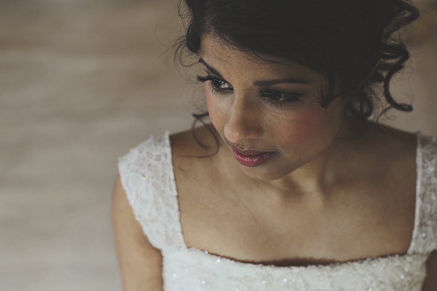Close-up of bride in white wedding dress
