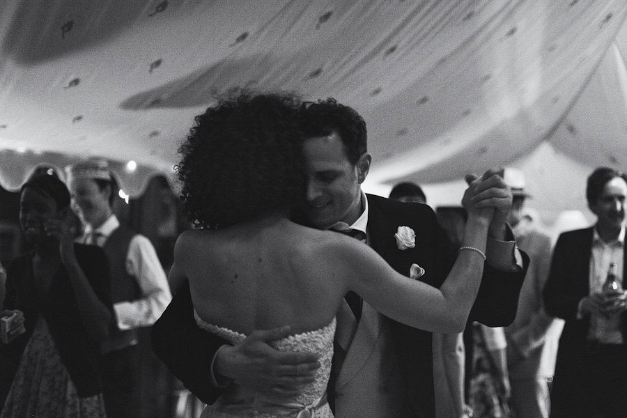 Bride and groom dancing at wedding reception