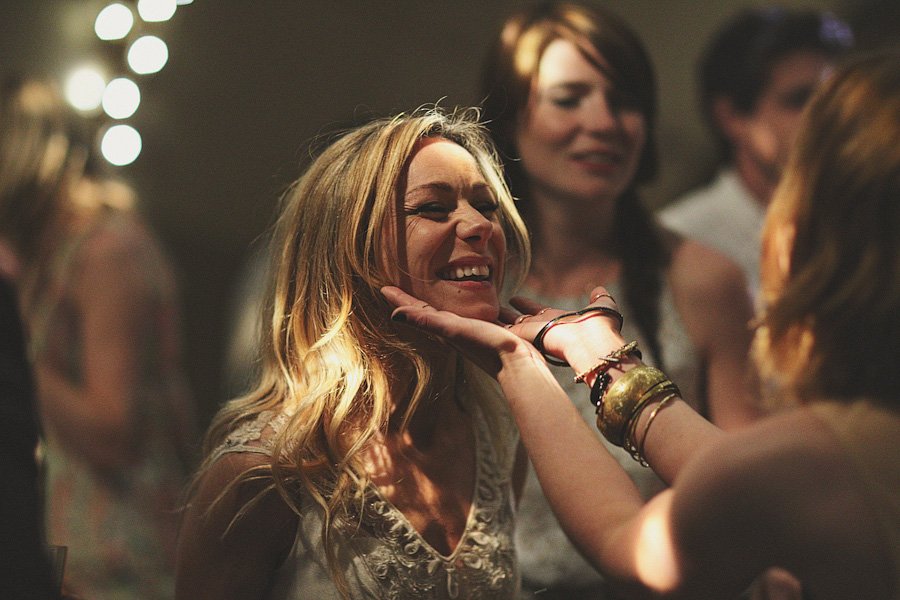 Friends laughing together at a lively party