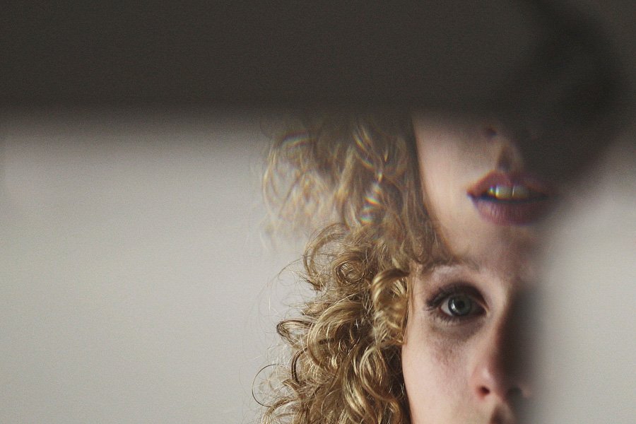 Abstract double exposure portrait of curly-haired person
