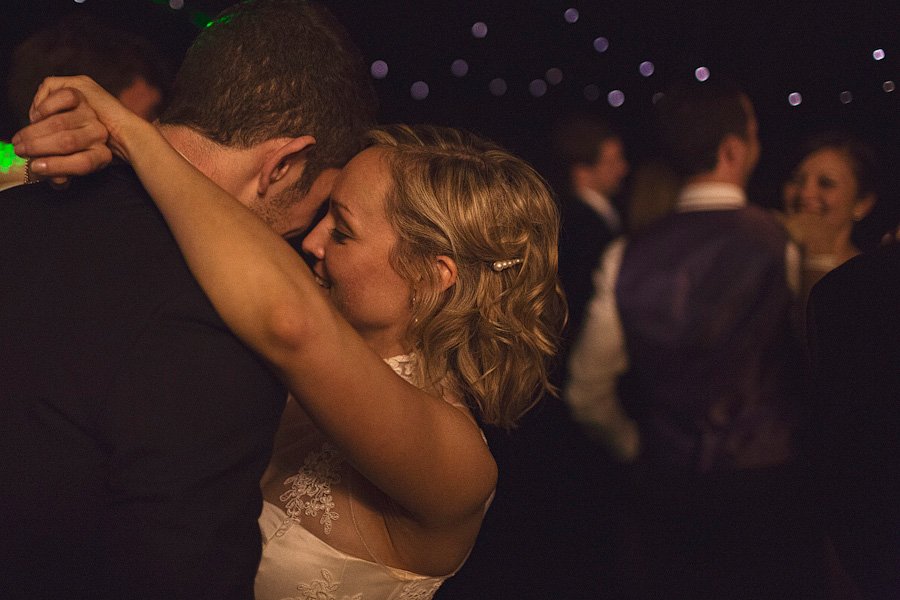 Bride and groom sharing a romantic dance