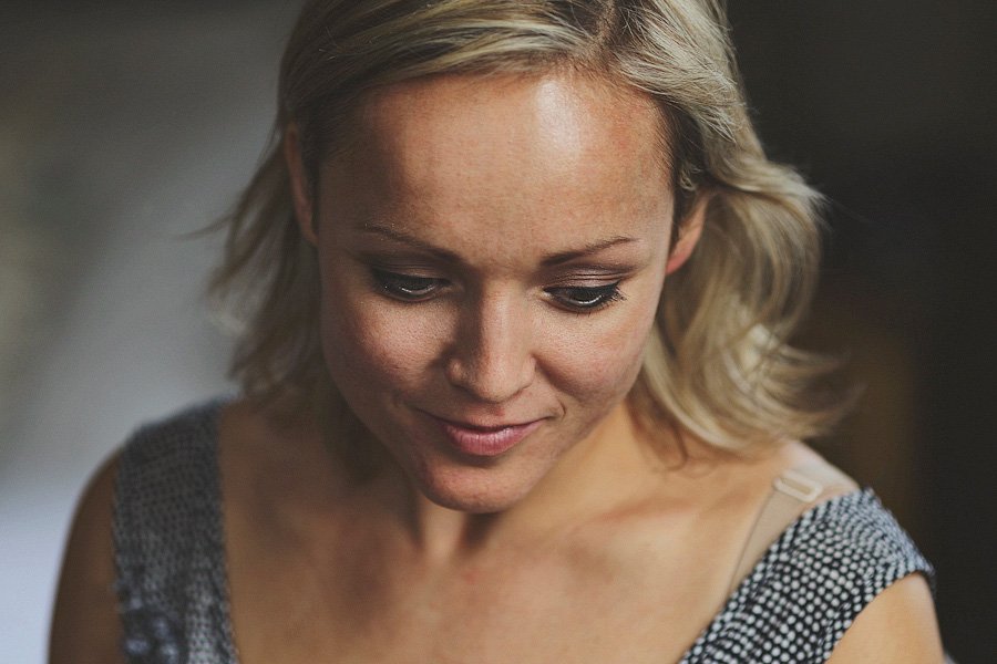 Close-up portrait of woman looking down