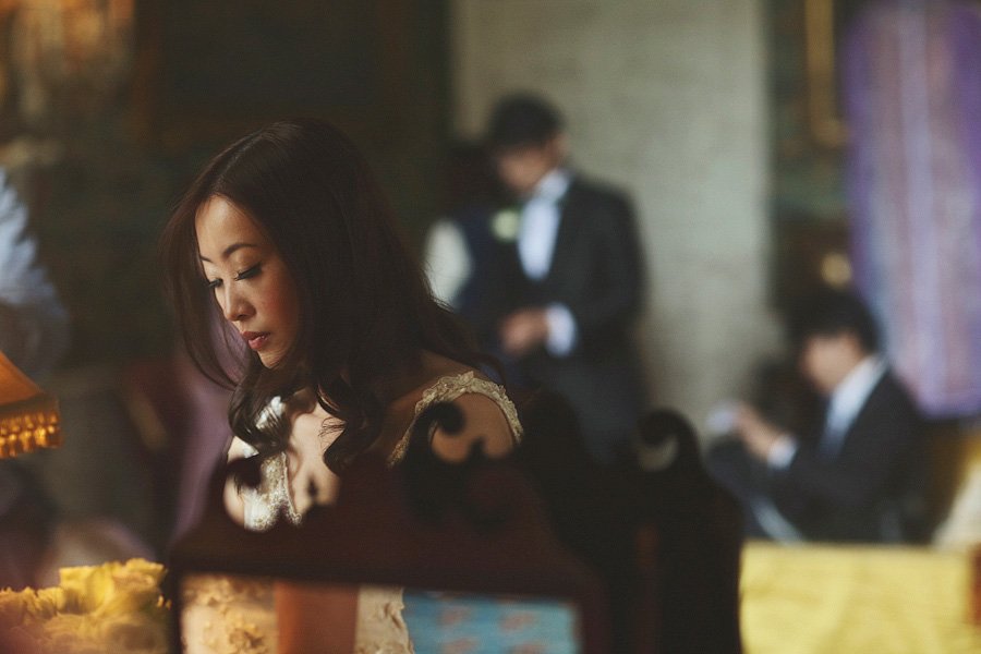 Elegantly dressed woman at formal indoor event