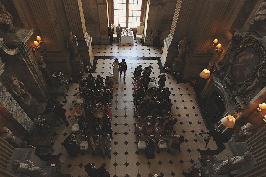 Overhead view of wedding ceremony in grand hall