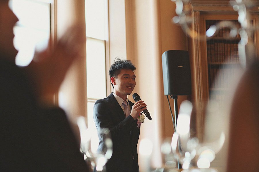 Man giving speech at formal indoor event
