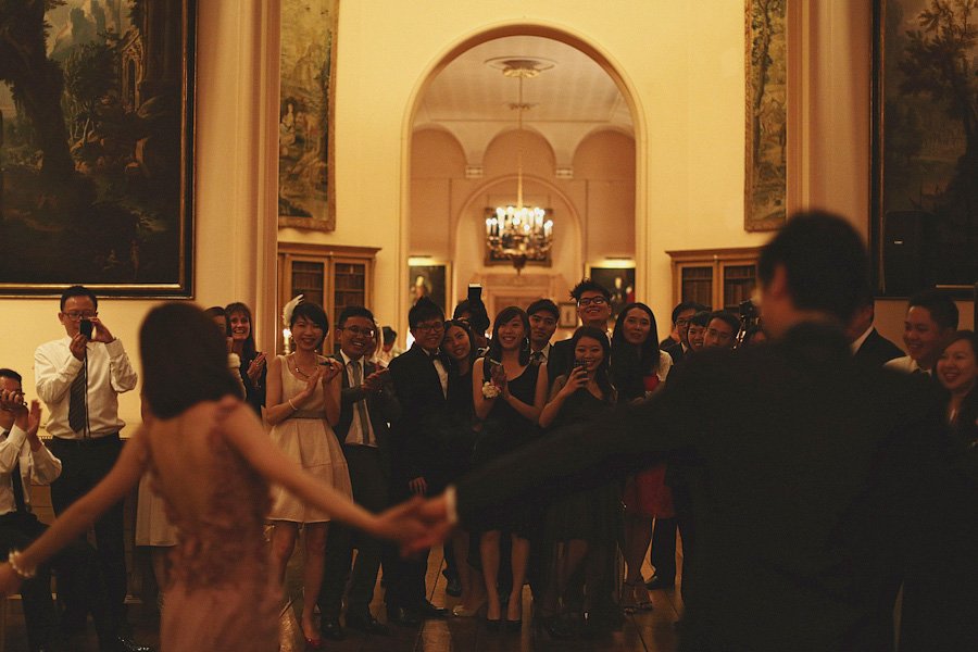 Couple dancing at elegant indoor wedding reception