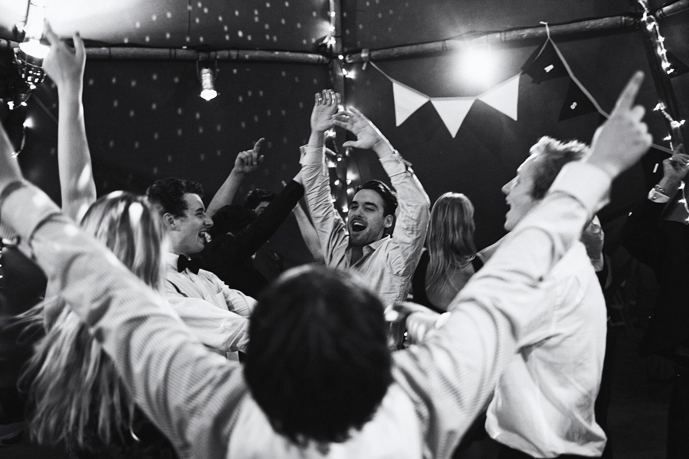 Friends dancing joyfully at a lively party