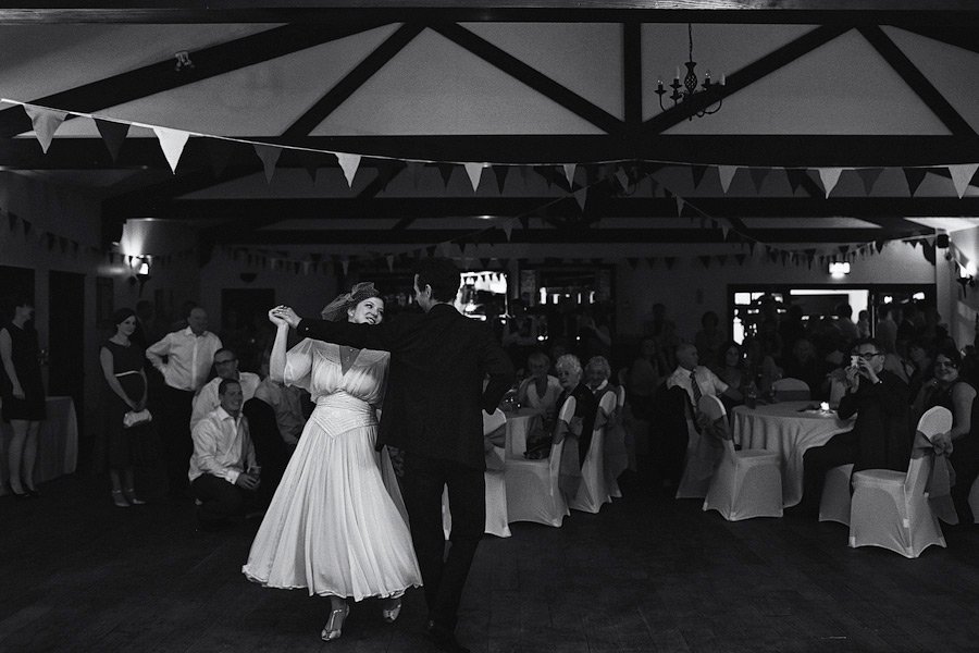 Bride and groom dancing at wedding reception