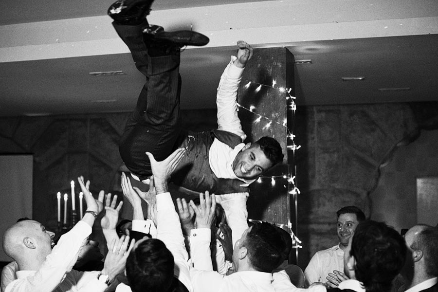Man lifted into air at wedding celebration