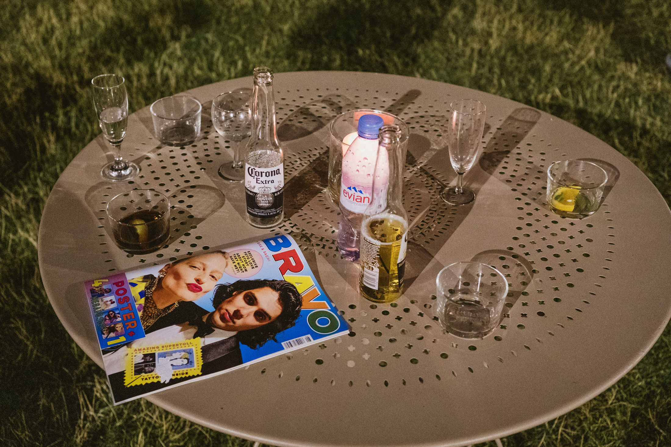 Wedding details at Chateau du Fey, the bride and groom's faces on a magazine