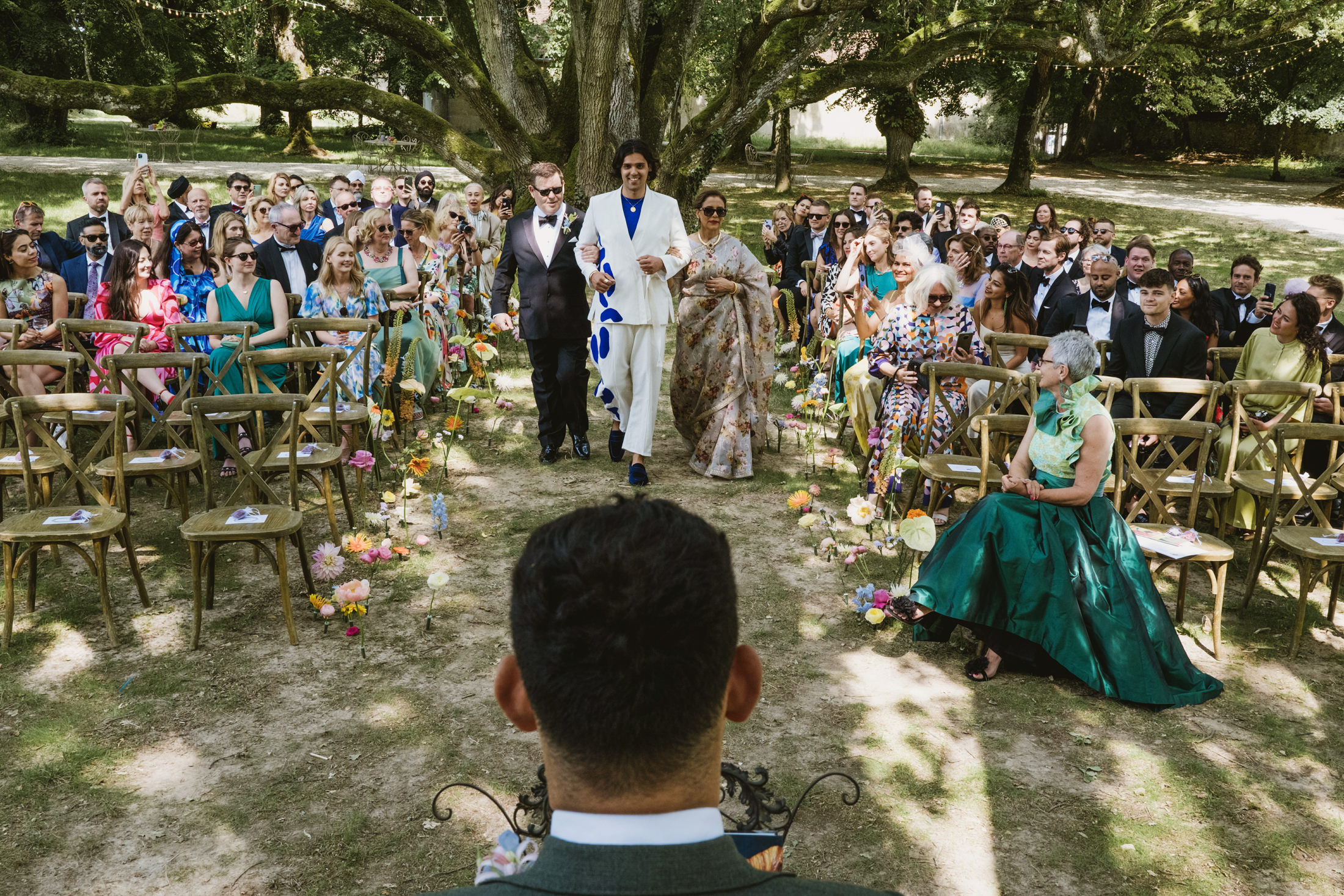 the groom making his ceremony entrance at Chateau du Fey in France