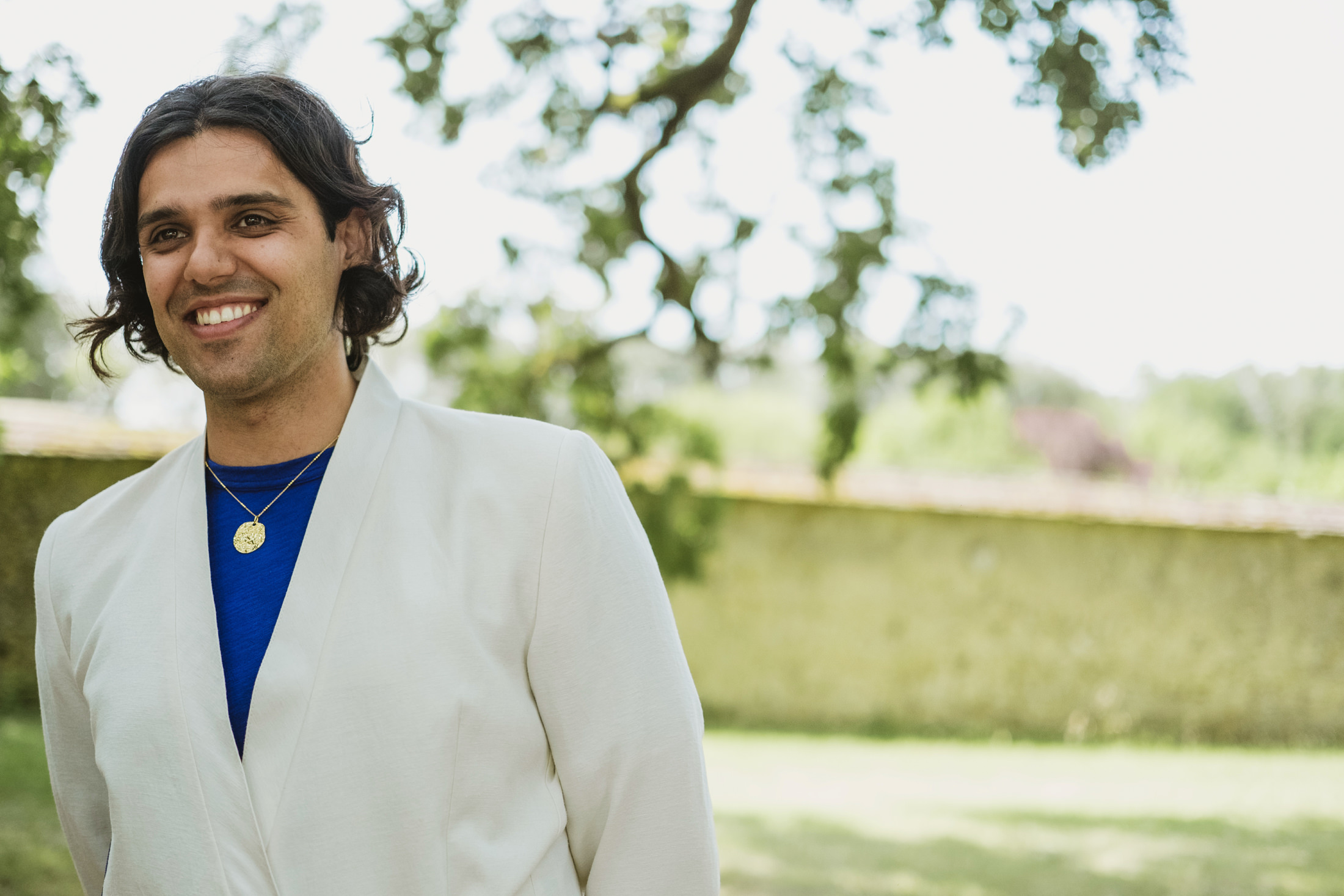 groom's first look at the bride at the ceremony in France at Chateau du Fey