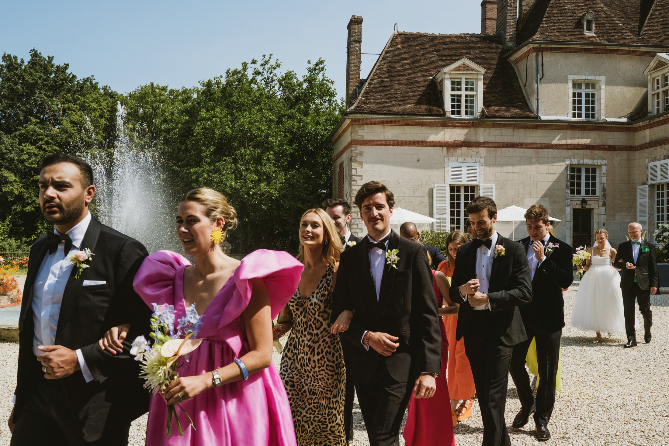 Bridal party and bride and father's entrance to the wedding at Chateau du Fey in France