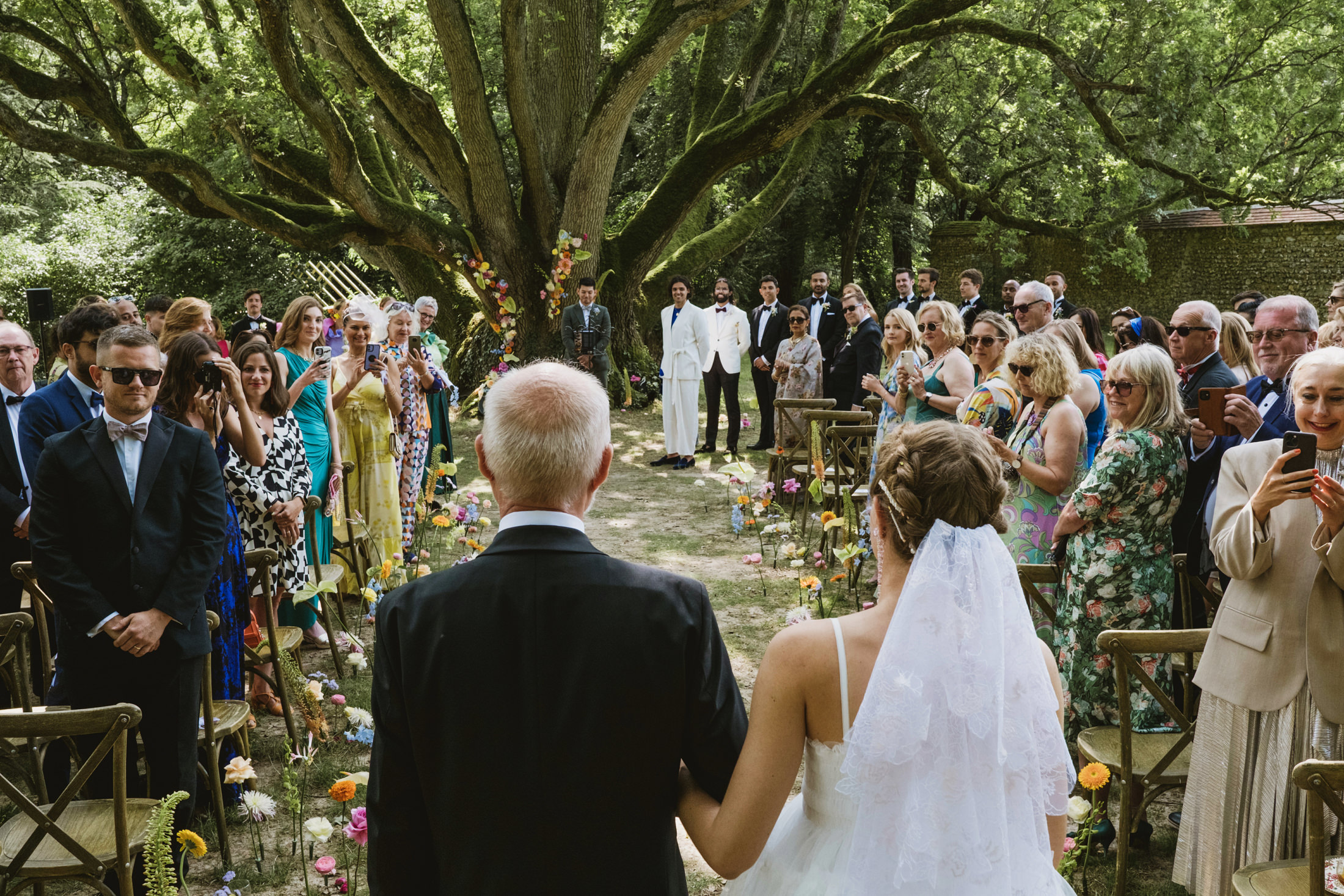 Chateau du Fey wedding ceremony. The bride and father make their entrance