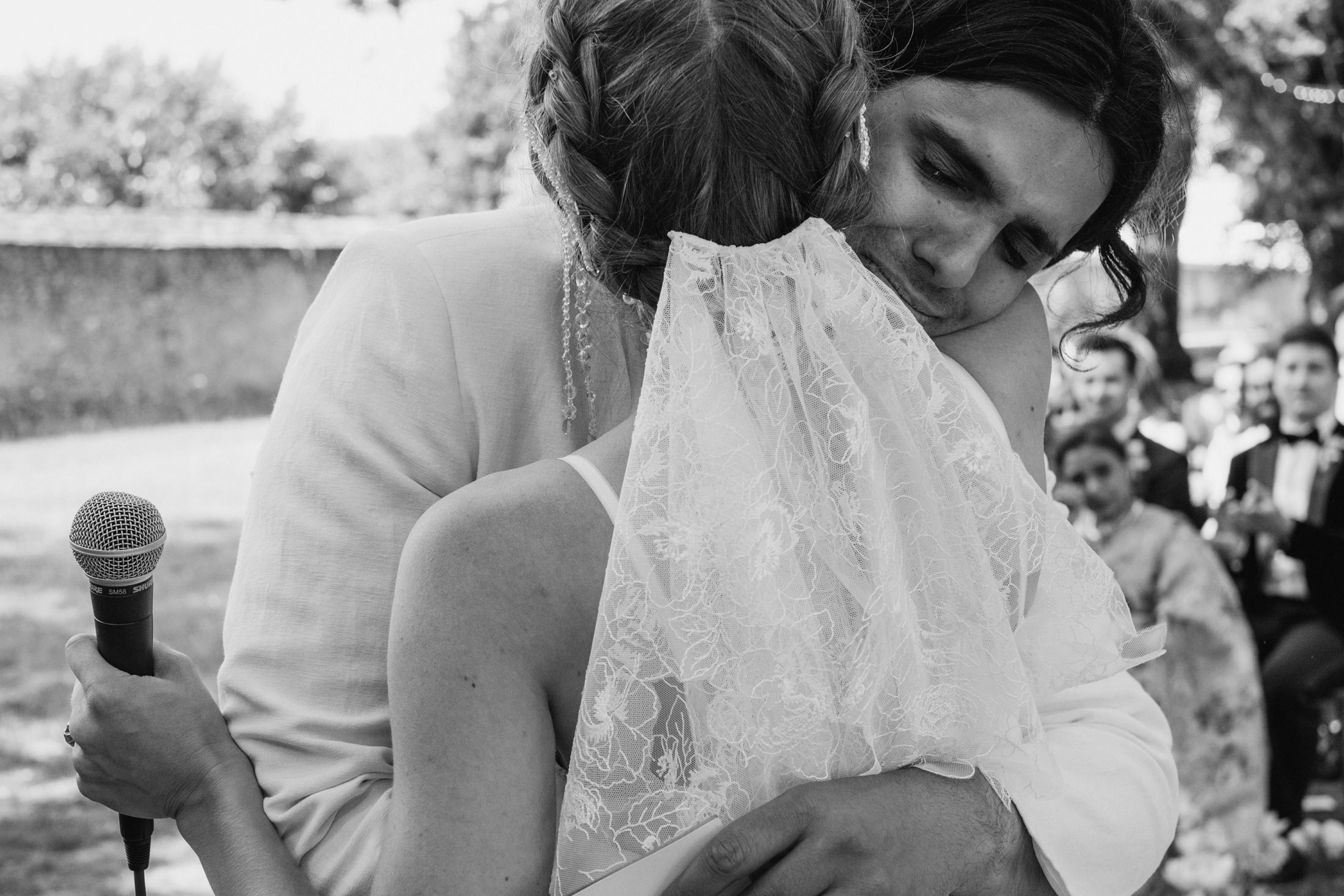 Chateau du Fey wedding ceremony, groom and bride hugging during the emotional french ceremony