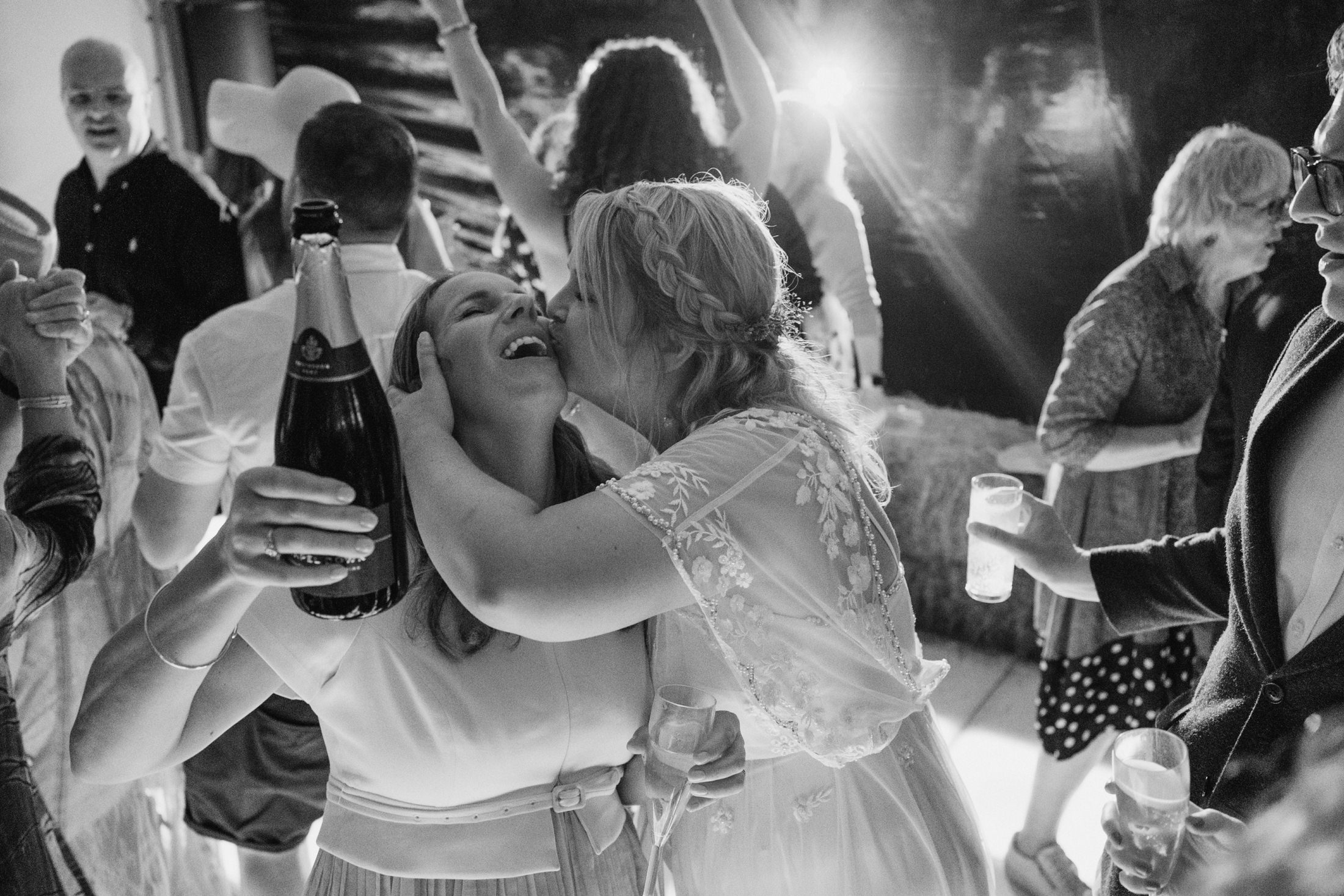 Women celebrating at a lively party with friends.