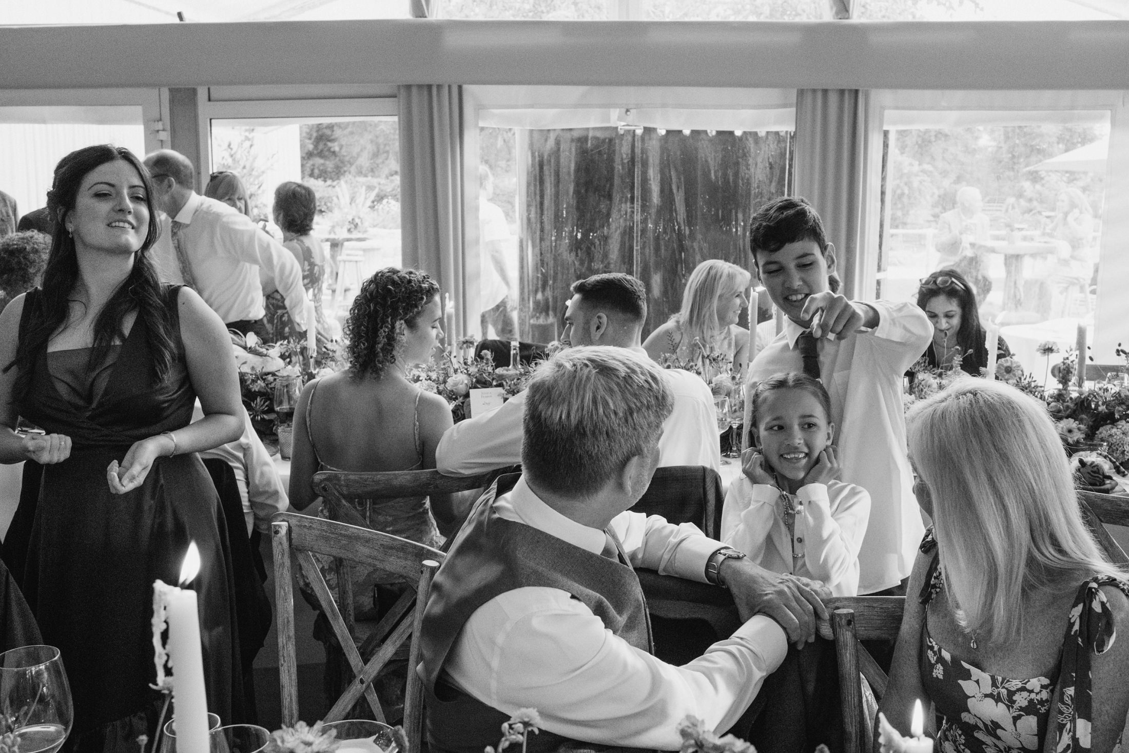 Guests celebrating at indoor wedding reception