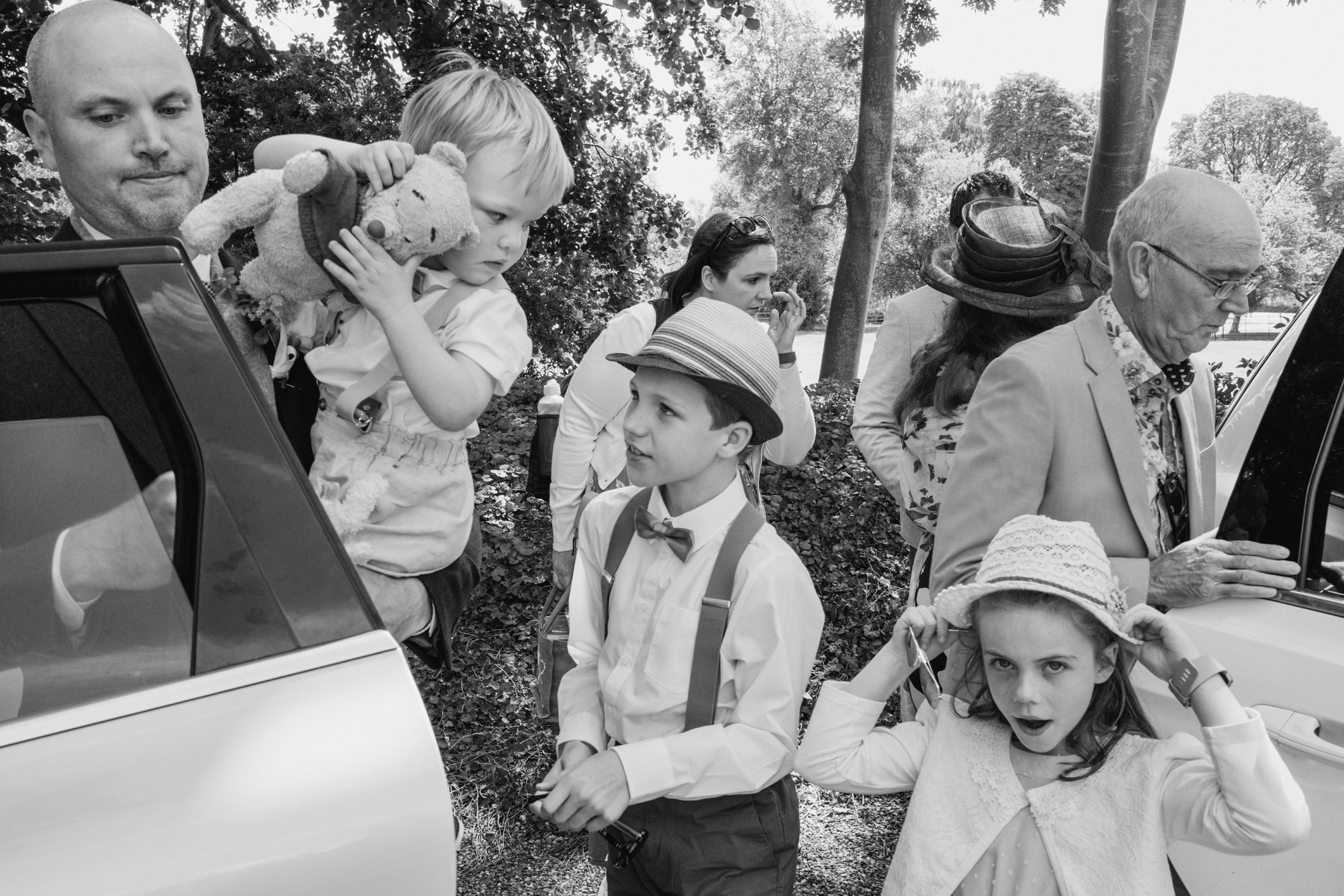 Family preparing for car journey at event