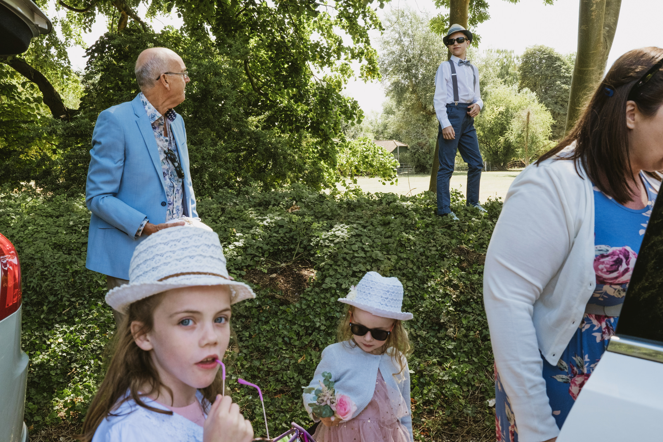 Family enjoying a sunny day in the garden.