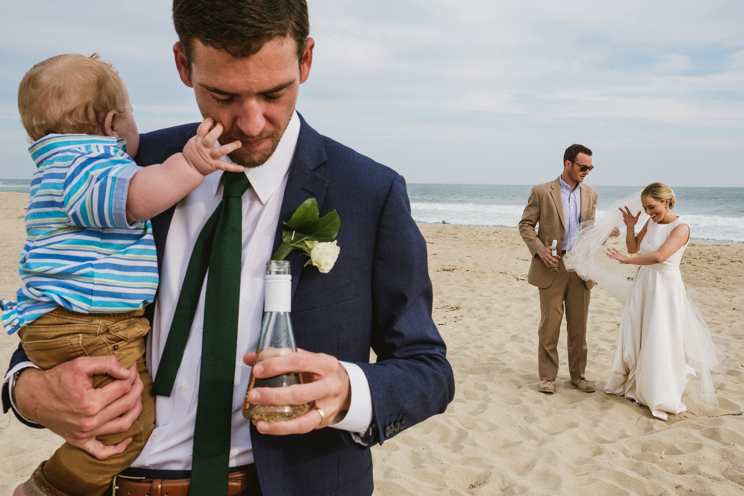 beach wedding reportage photography - bride and groom unposed
