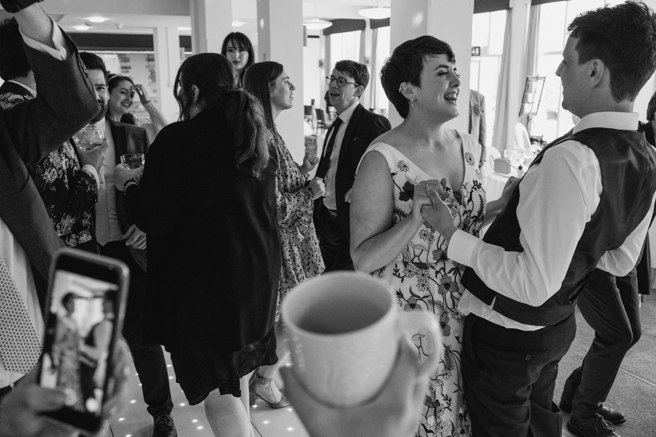 People dancing and celebrating at a party