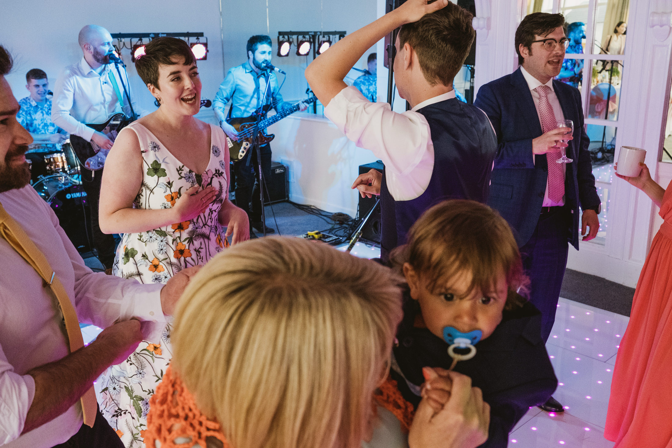 People dancing at a lively party.