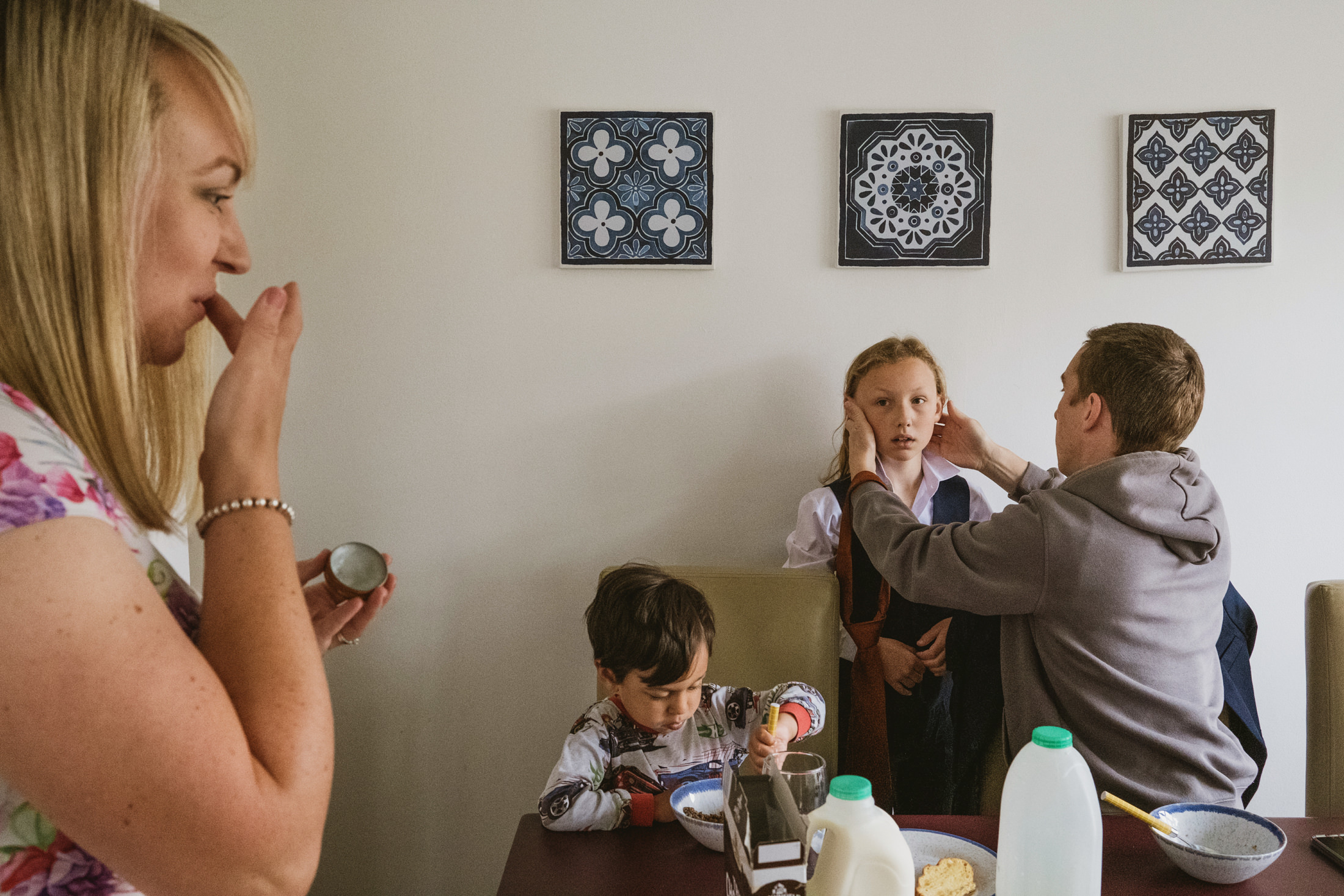 Family morning routine with breakfast and getting dressed